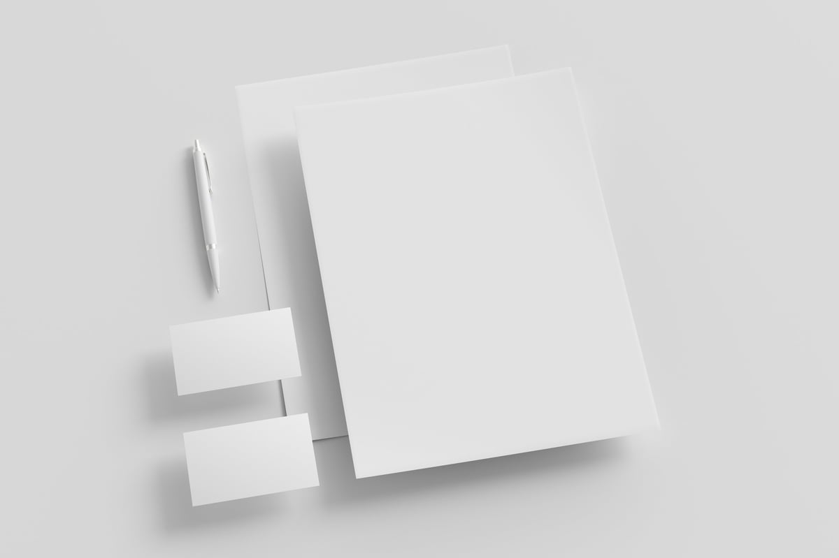 Blank corporate stationery set mockup with sheets of office paper, business cards and pen on white background. Branding mock up.