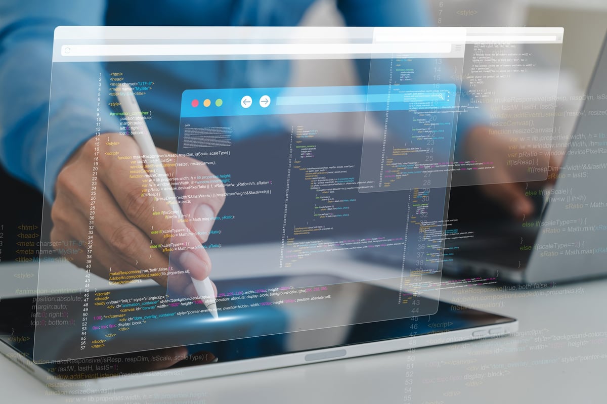 Professional programmer hands on tablet with coding code interface, Software development and web development.