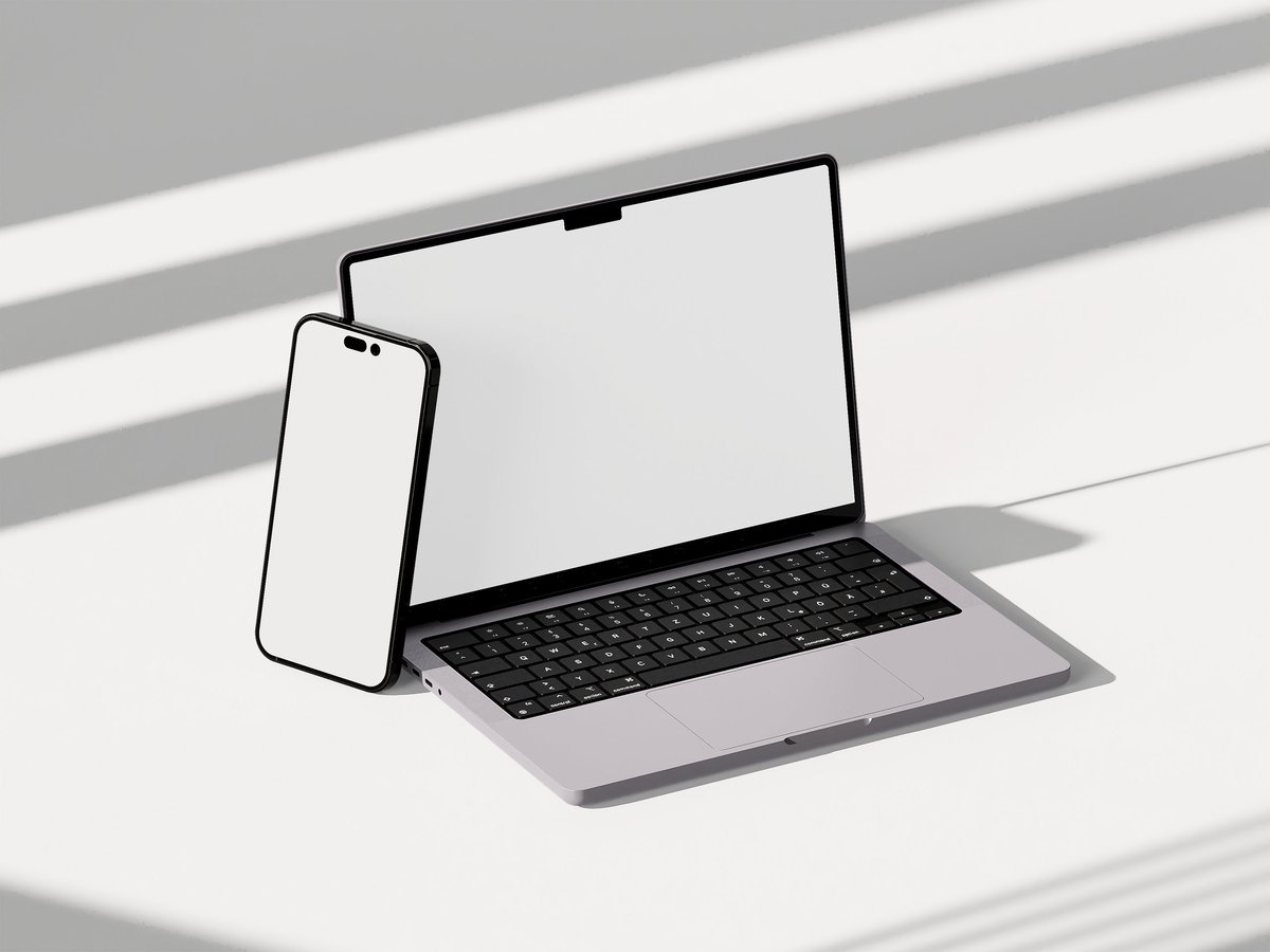 Laptop and smartphone mockup blank screen sunlight 3D render.